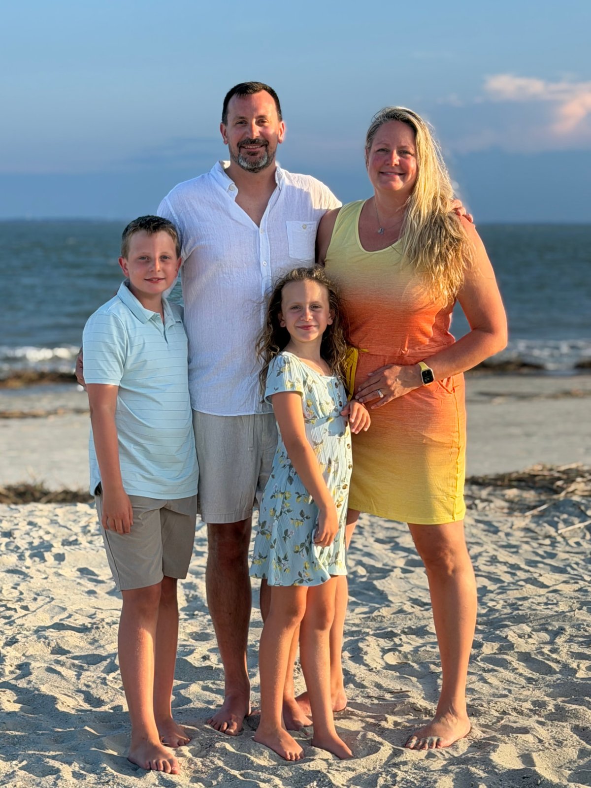 The Noll family at sunset on the beach