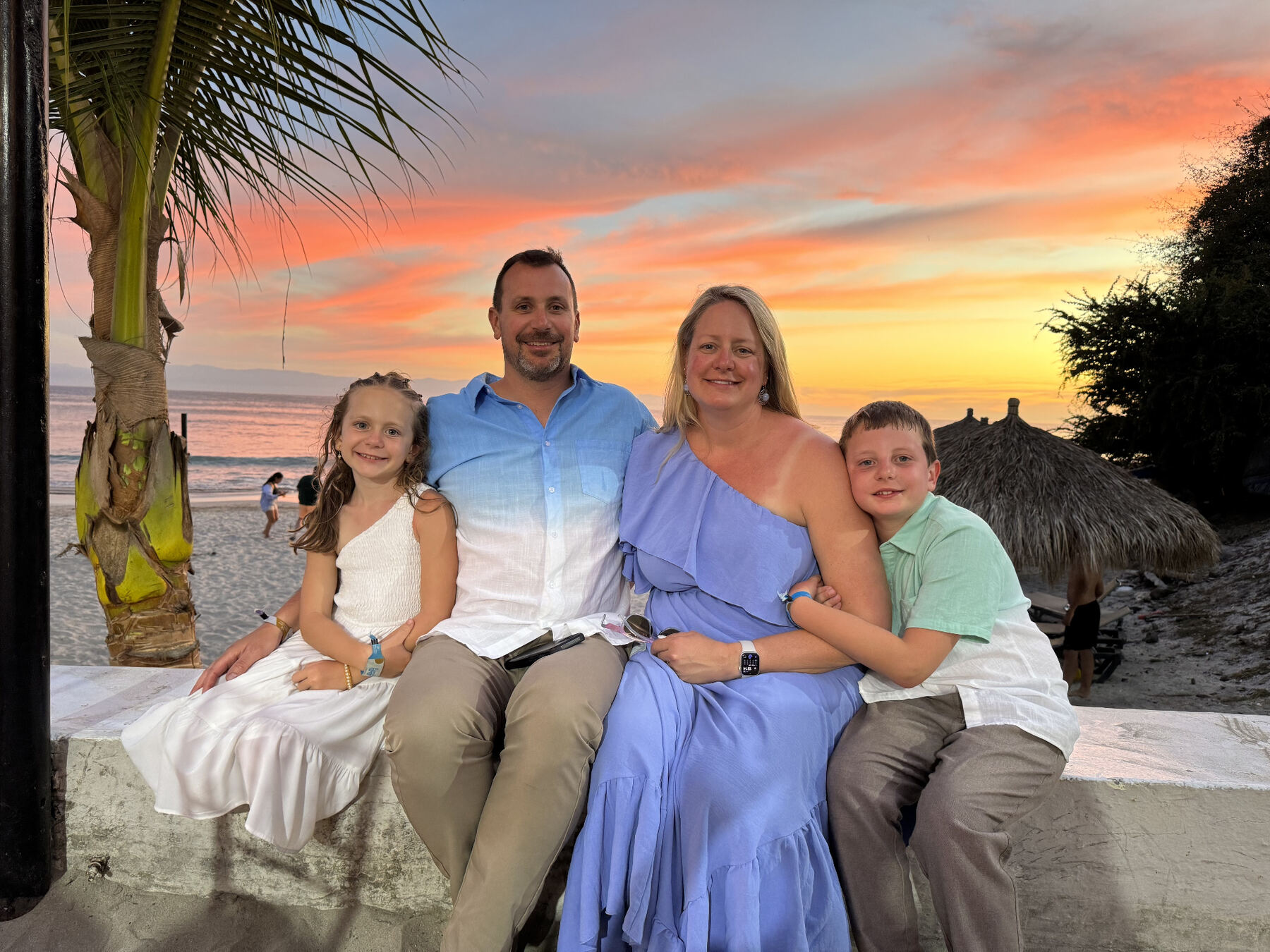 The Noll family at sunset on the beach